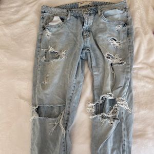 Garage distressed denim light wash jeans